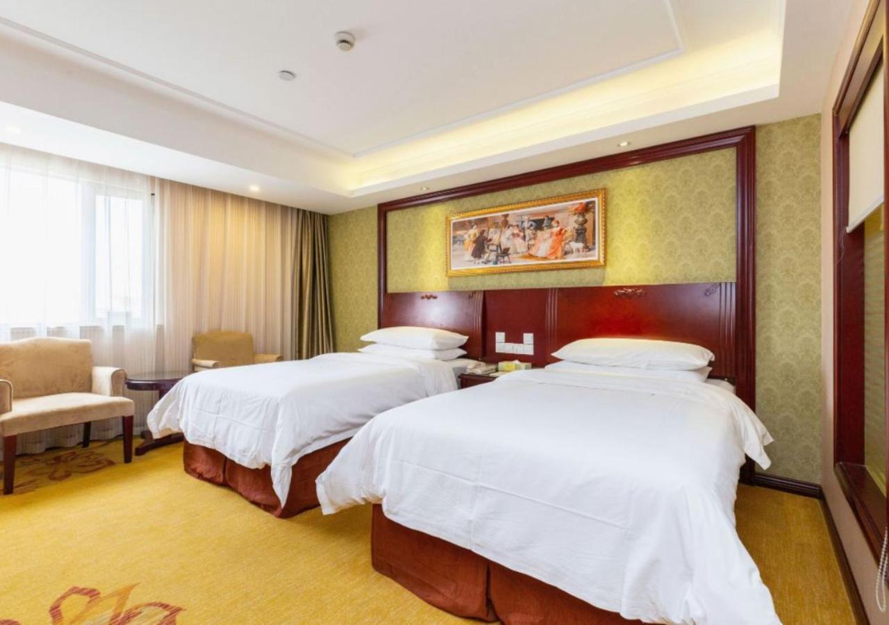 Vienna International - Jiaotong Humin Road Hotel 3*